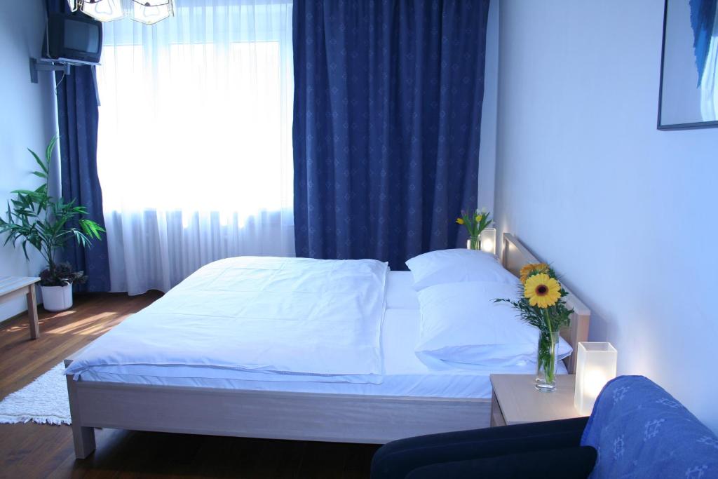 Postel nebo postele na pokoji v ubytování Pension Filip