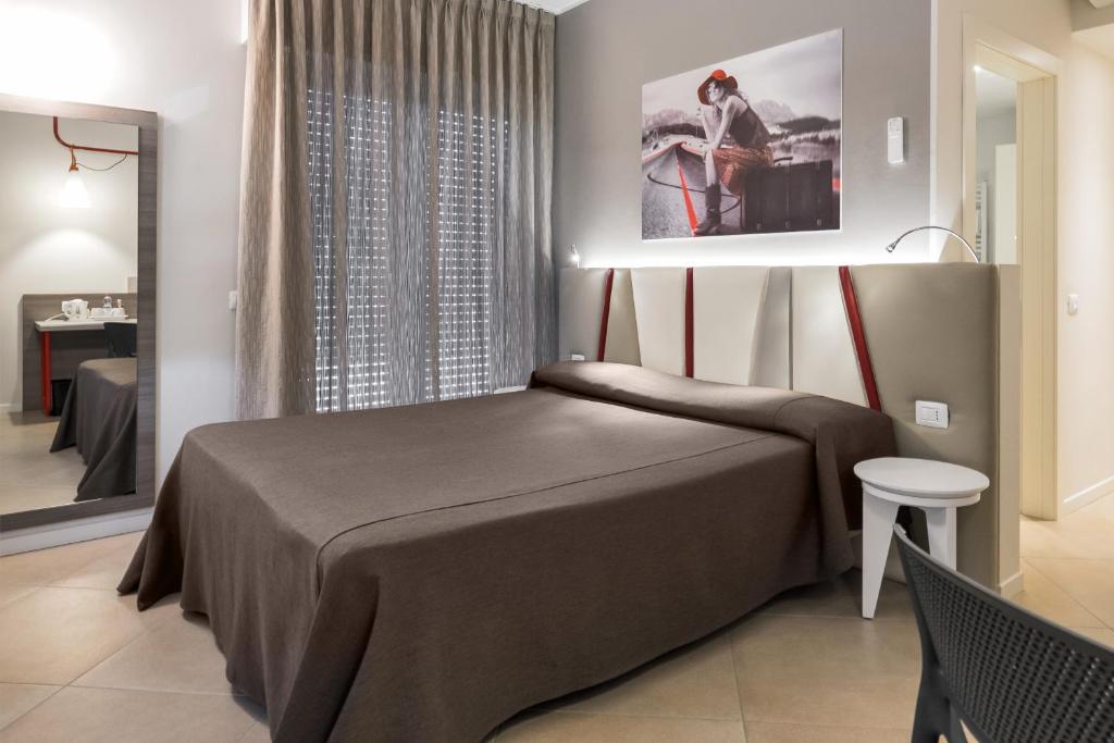 Postel nebo postele na pokoji v ubytování Guesthouse Verona
