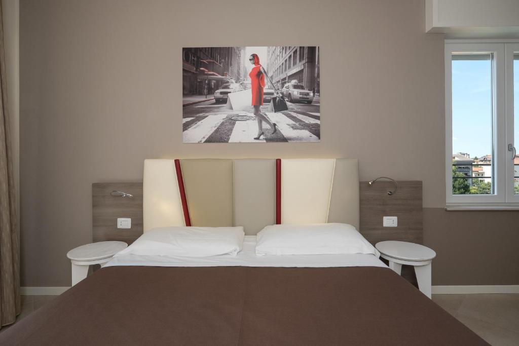 Postel nebo postele na pokoji v ubytování Guesthouse Verona