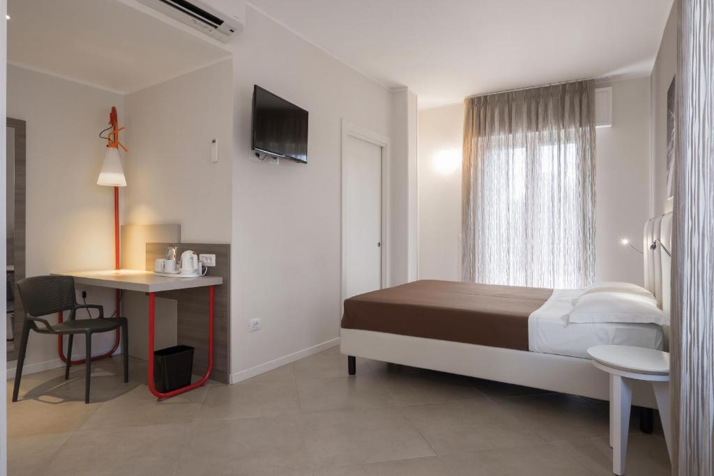 Postel nebo postele na pokoji v ubytování Guesthouse Verona