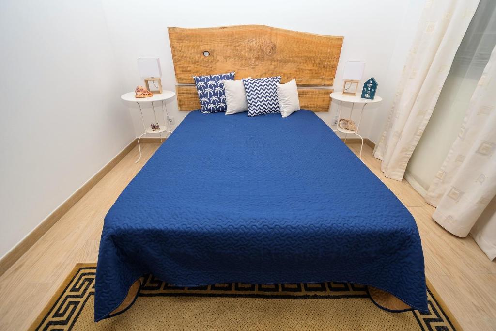Postel nebo postele na pokoji v ubytování Basalto Negro AL