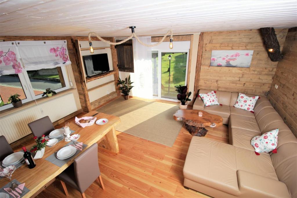 an aerial view of a living room in a tiny house at Traumhafte Ferienwohnungen im Naturpark Zittauer Gebirge Haus Tanneck in Hain