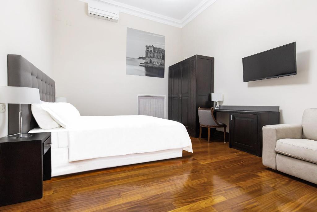 A television and/or entertainment centre at Gramsci Suites