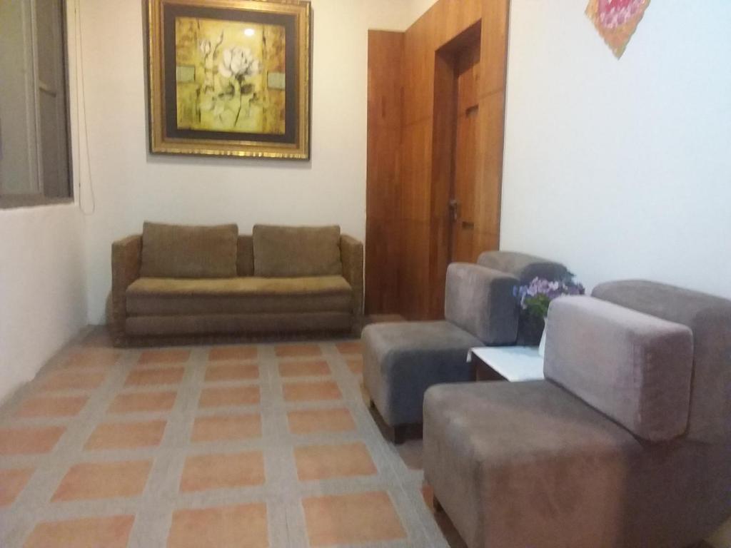 Posezení v ubytování Niuniu & Meng Ka Homestay