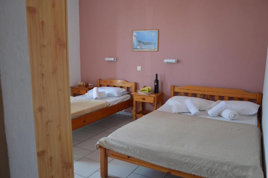 a room with two beds in a room at Asteri's Summer in Paralia Katerinis