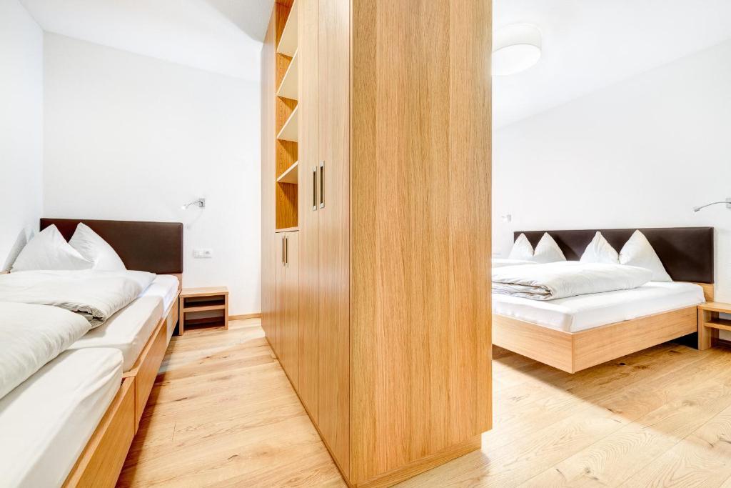 Postel nebo postele na pokoji v ubytování Damüls Appartements