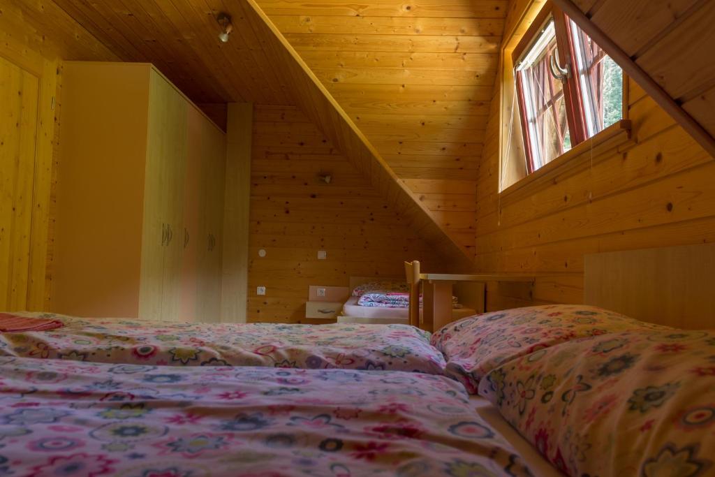 Postel nebo postele na pokoji v ubytování Apartments Petek