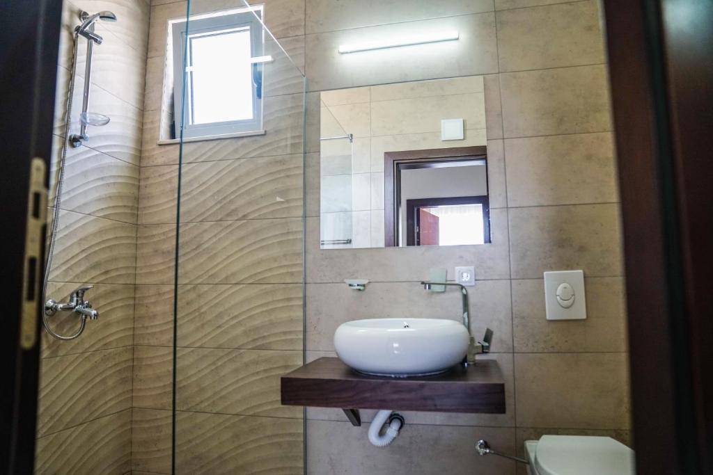 Koupelna v ubytování La Dolce Vita Residence