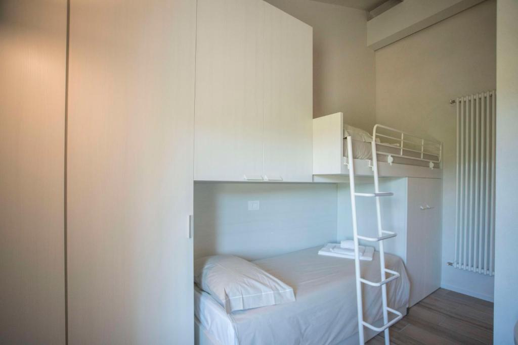Poschodová posteľ alebo postele v izbe v ubytovaní Relais Madergnago