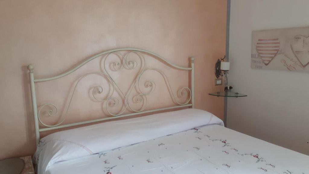 Postel nebo postele na pokoji v ubytování B&B La Casa sul Colle