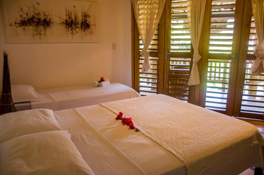 Cama ou camas em um quarto em Residence Bons Ventos Jeri