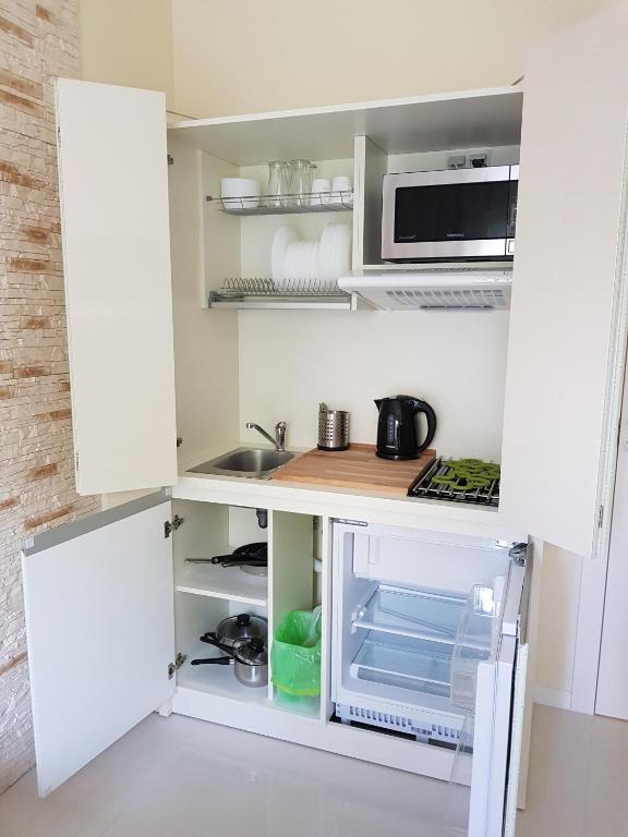Kuchyň nebo kuchyňský kout v ubytování Apartamenty Dom Saski 10 minut od Centrum Warszawy