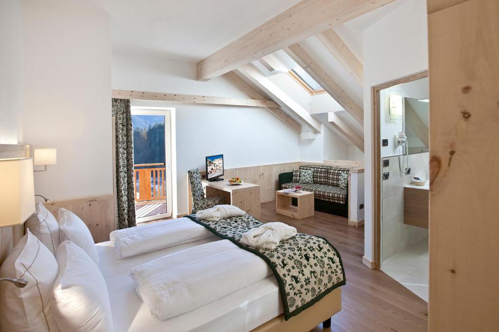 Posteľ alebo postele v izbe v ubytovaní Rio Stava Family Resort & Spa