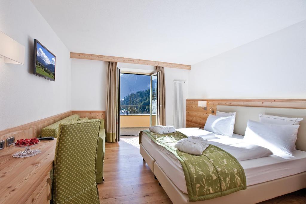 Posteľ alebo postele v izbe v ubytovaní Rio Stava Family Resort & Spa