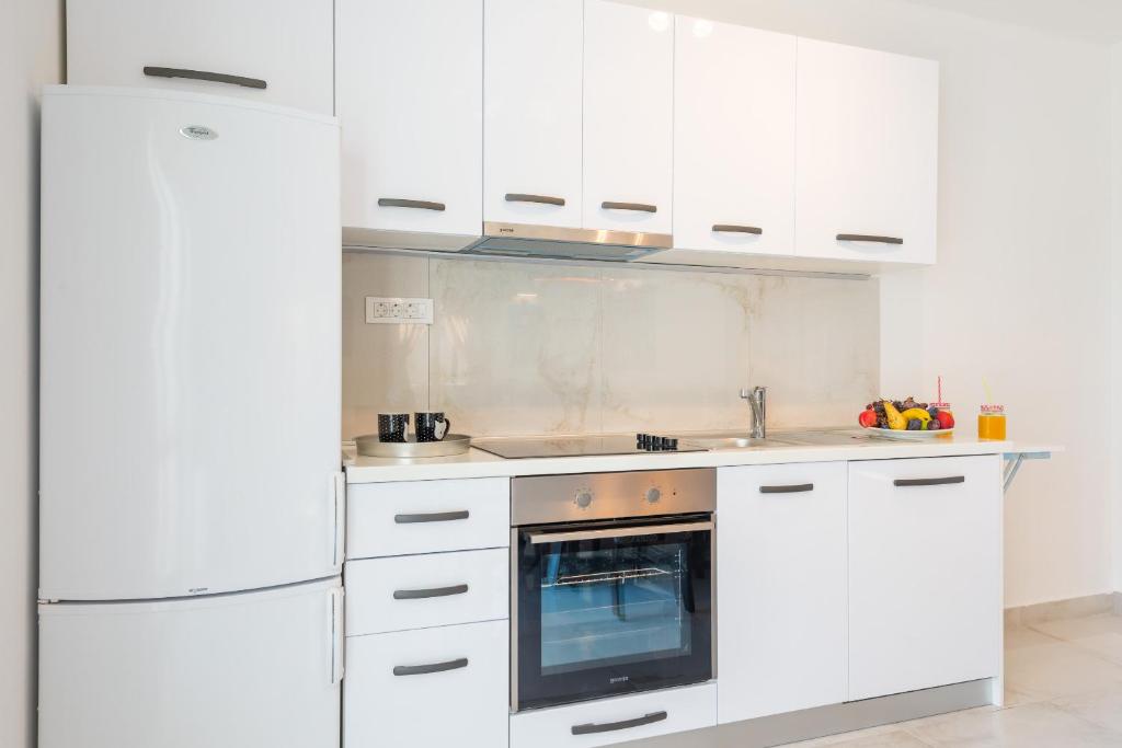 Kuchyň nebo kuchyňský kout v ubytování Comfort Apartment Lucy