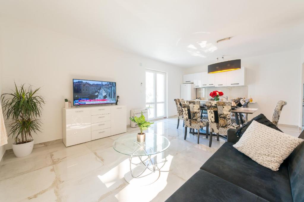 TV a/nebo společenská místnost v ubytování Comfort Apartment Lucy