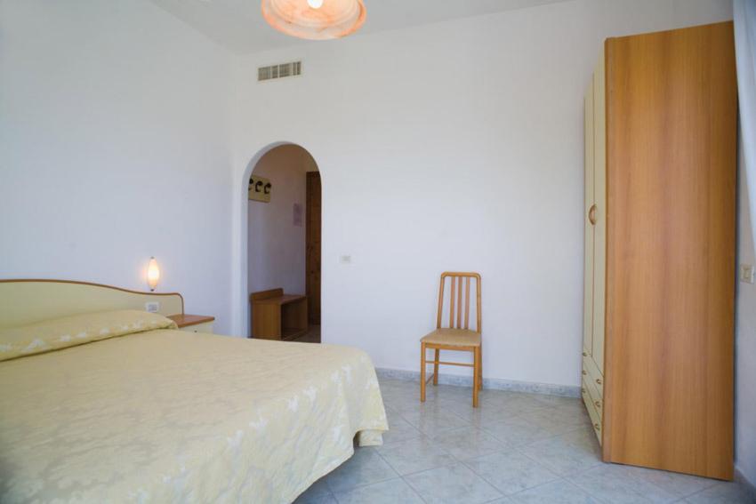 Postel nebo postele na pokoji v ubytování Villa Natalina