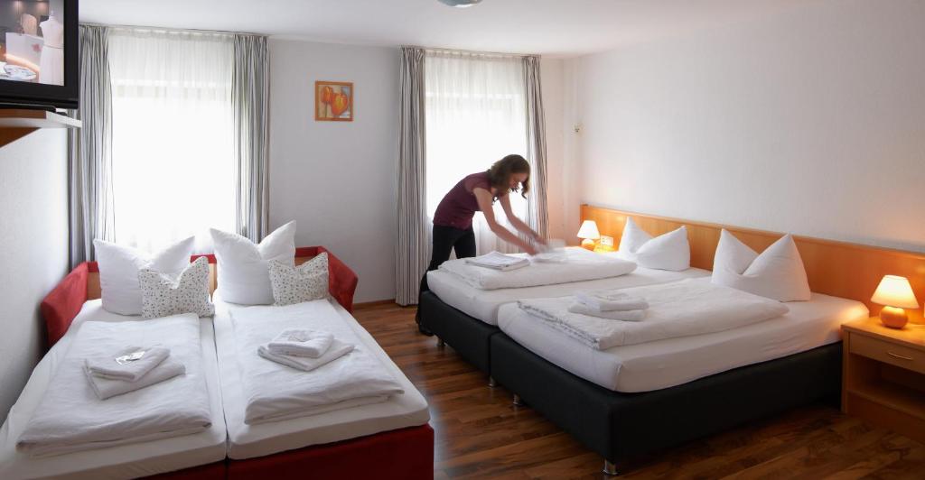 Postel nebo postele na pokoji v ubytování Goldene Traube