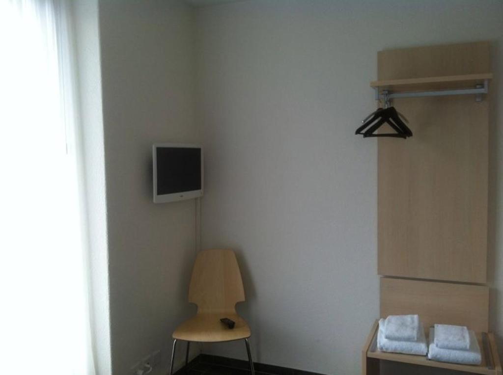 TV a/nebo společenská místnost v ubytování Hotel Central
