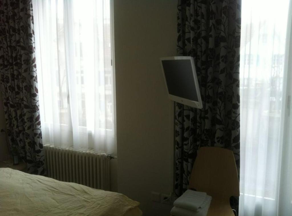 TV a/nebo společenská místnost v ubytování Hotel Central