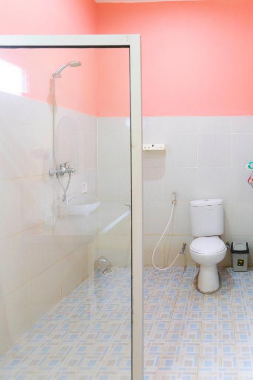 Koupelna v ubytování Pondok Guru Bakti Cottage