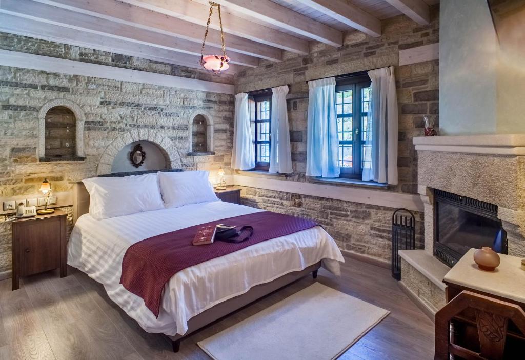 Postel nebo postele na pokoji v ubytování Gioraldi Art Hotel