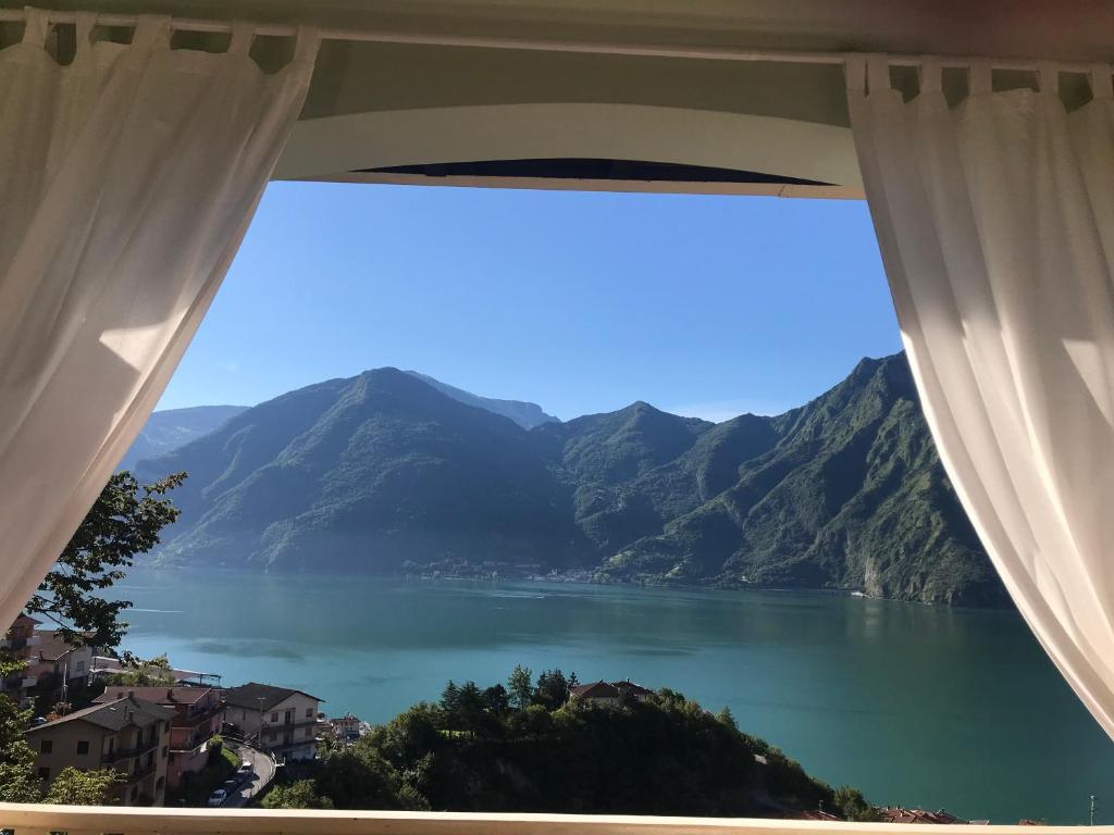 a view of a lake from a window at B&B Bellavista in Castro