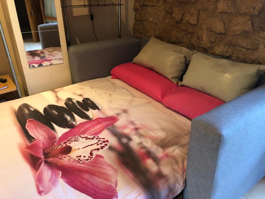 A bed or beds in a room at apartemento rural