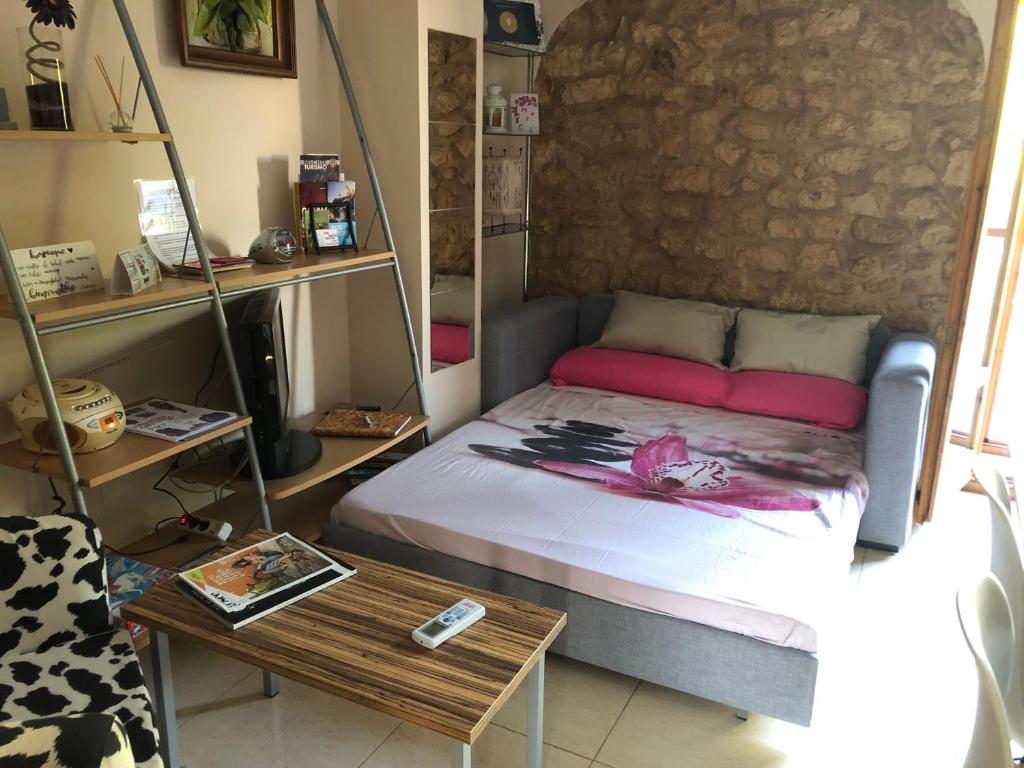 A bed or beds in a room at apartemento rural