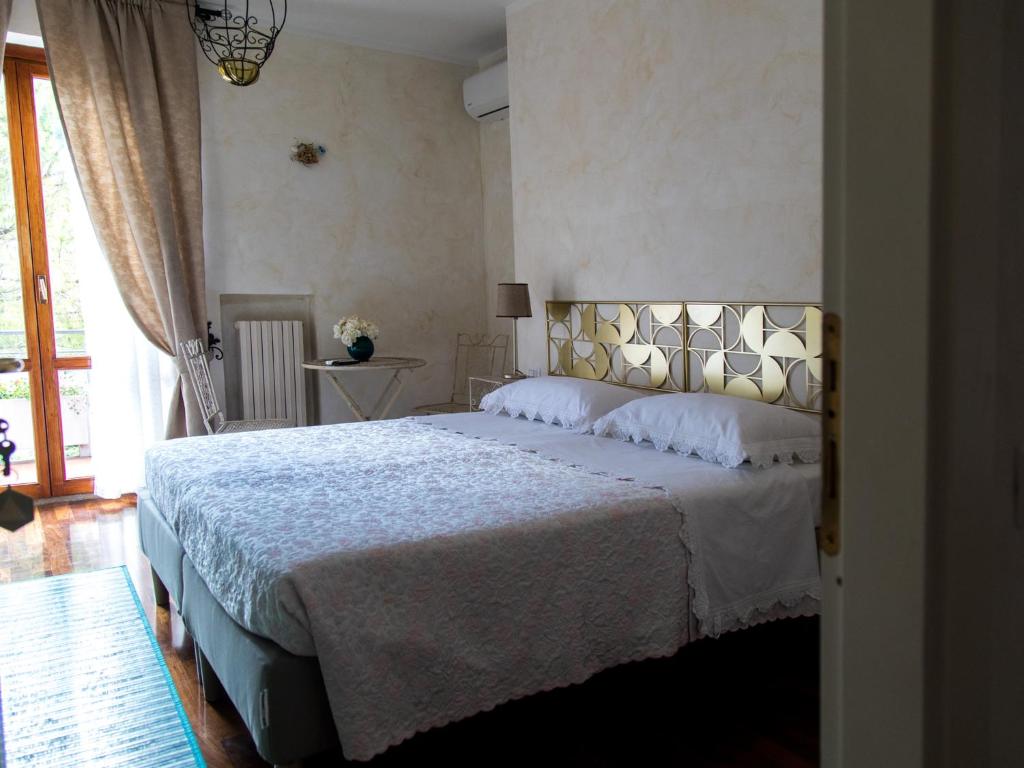 A bed or beds in a room at Il Sestante