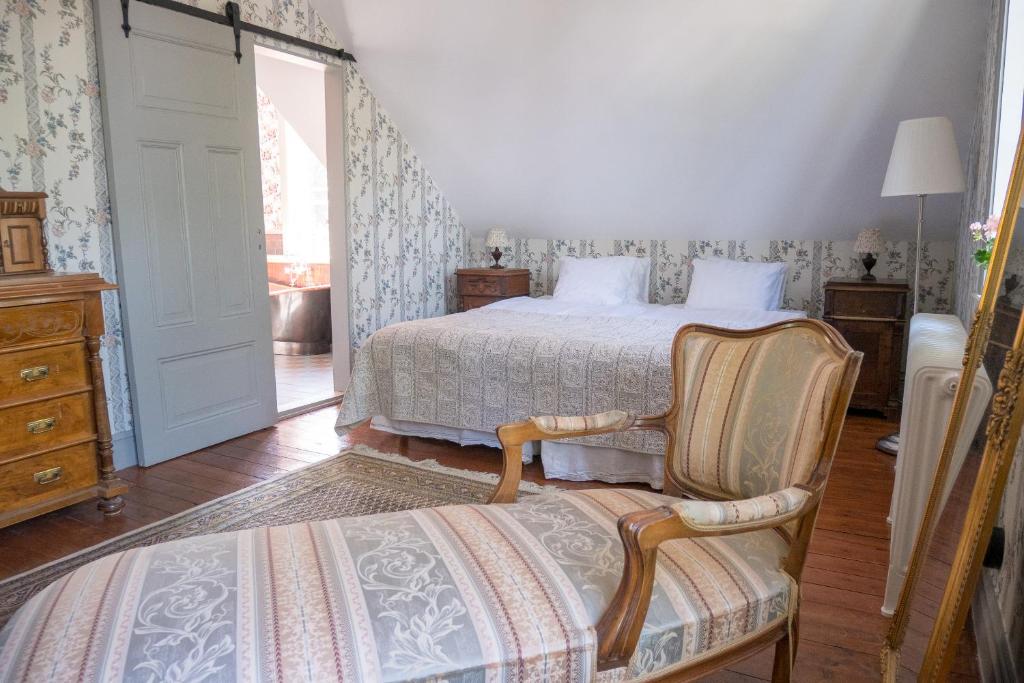 Postel nebo postele na pokoji v ubytování Warfsholm