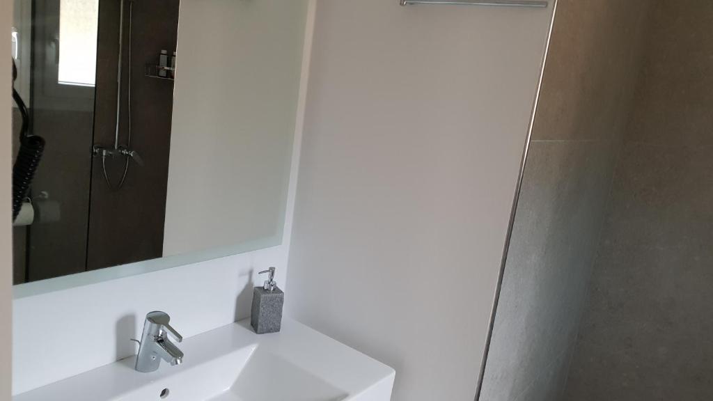 Koupelna v ubytování Hibiscus Suites - A