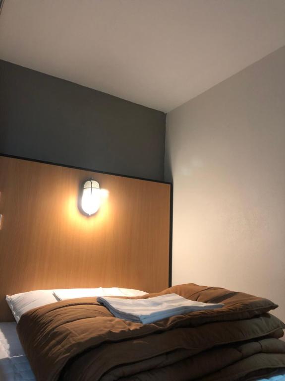 Postel nebo postele na pokoji v ubytování Thyme Xeriscape Hostel