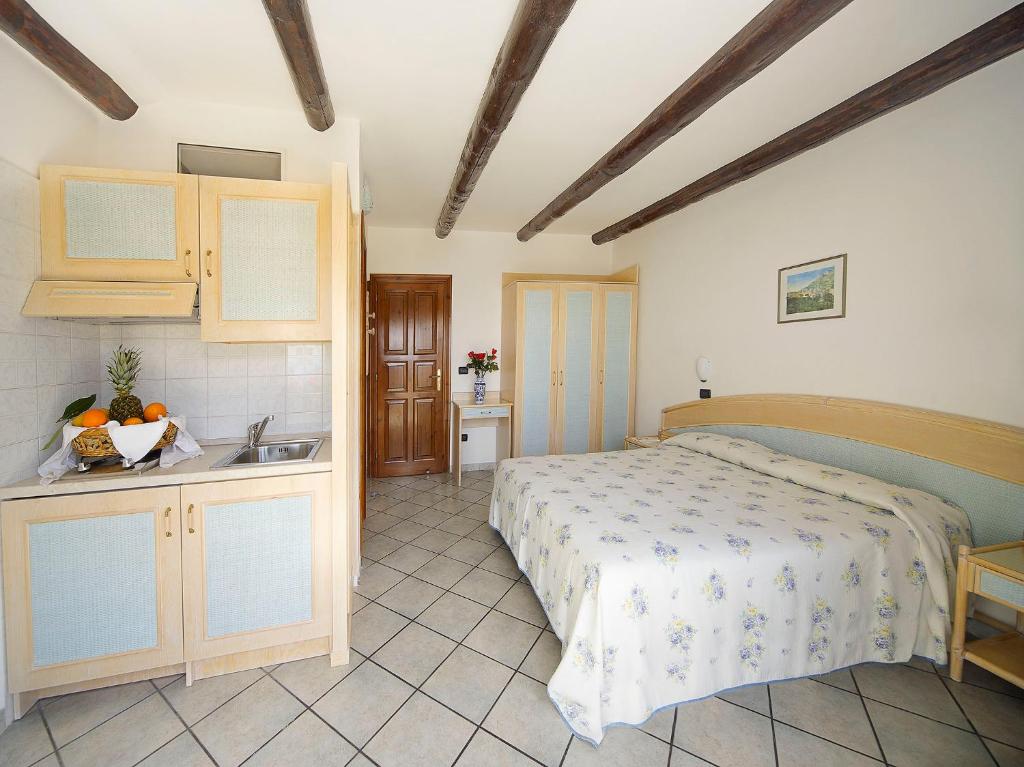 Postel nebo postele na pokoji v ubytování Hotel Casa del Sole