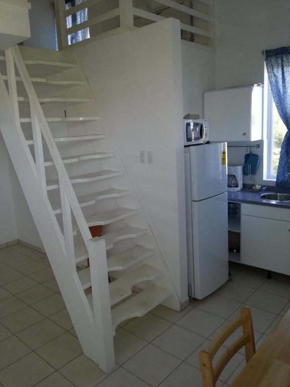 Kuchyň nebo kuchyňský kout v ubytování Orange Rembrandt Studio Apartments