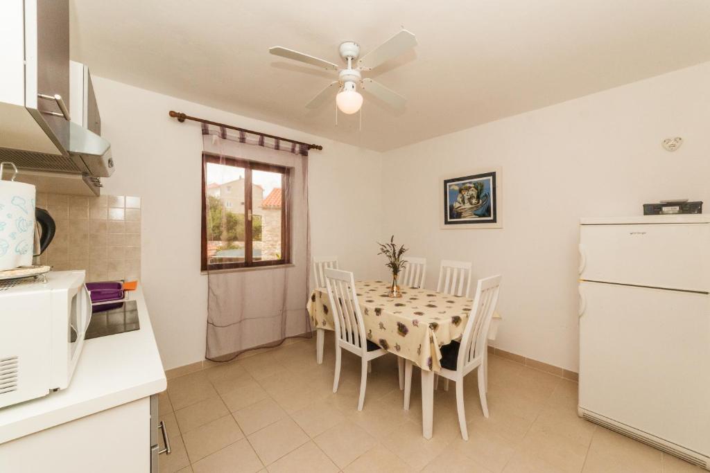 Kuchyň nebo kuchyňský kout v ubytování Apartments Fedrigo