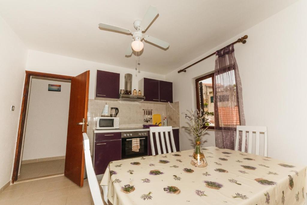 Kuchyň nebo kuchyňský kout v ubytování Apartments Fedrigo