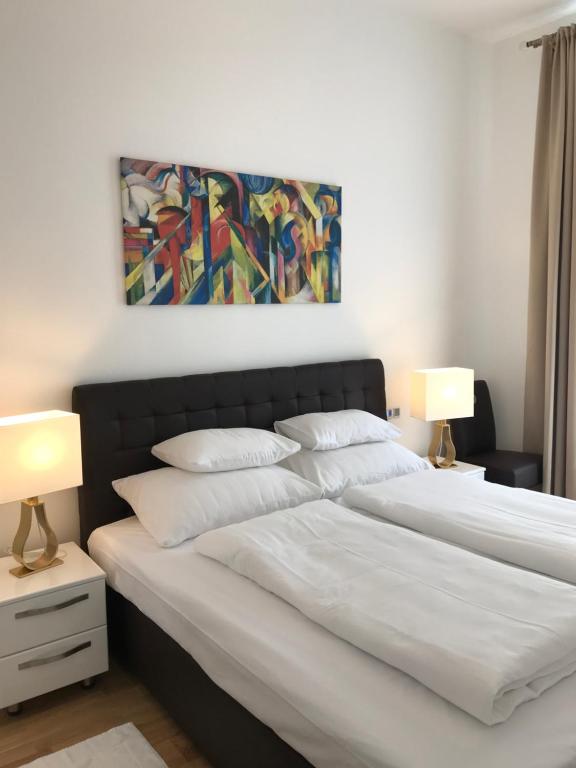 Posteľ alebo postele v izbe v ubytovaní Steiner Residences Vienna Taborstrasse