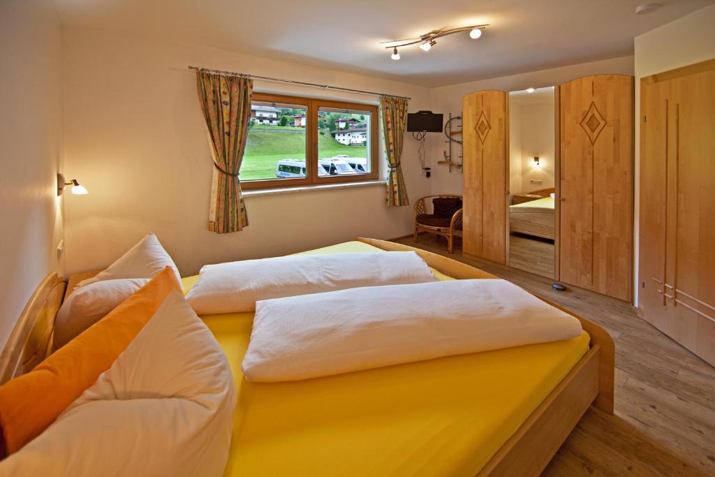 Postel nebo postele na pokoji v ubytování Apartment Oberbichl