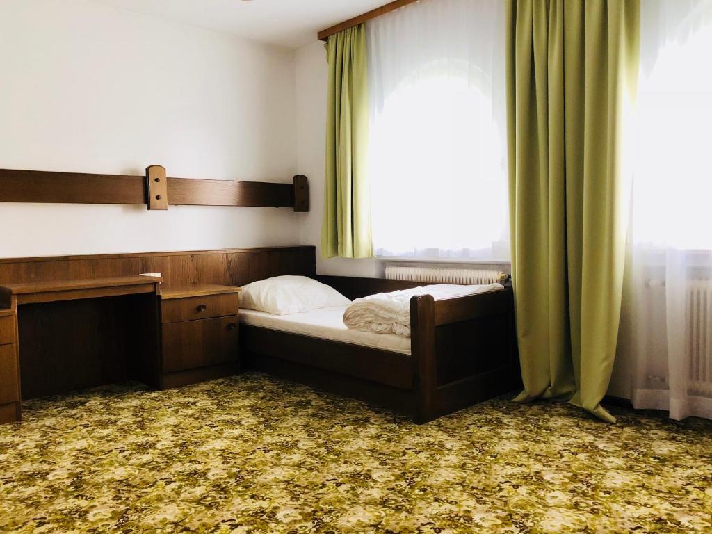 Postel nebo postele na pokoji v ubytování Rafael Kaiser Residence Privée - Spielberg Obdach
