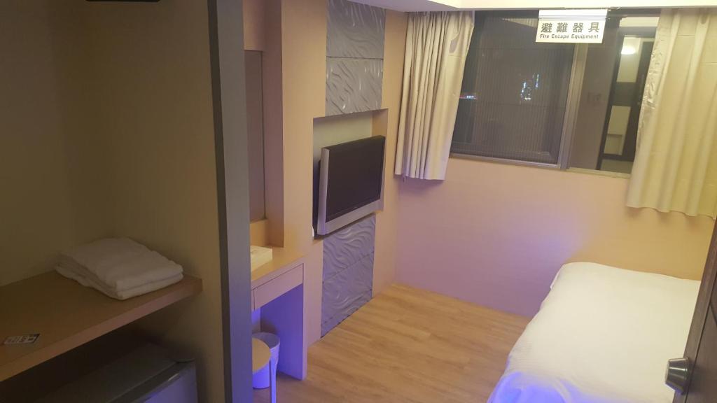 TV a/nebo společenská místnost v ubytování Honey Prince