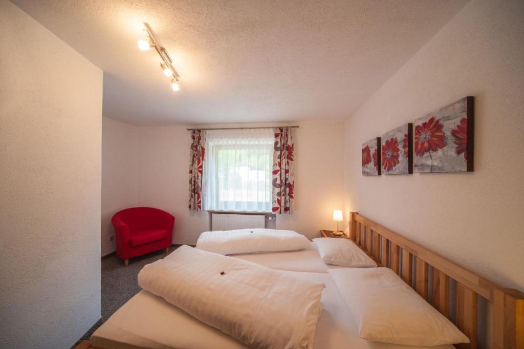 Postel nebo postele na pokoji v ubytování Haus Lusspark