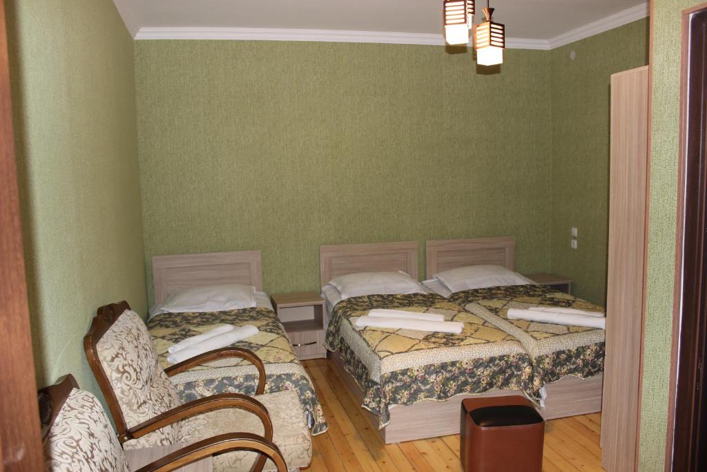 Postel nebo postele na pokoji v ubytování Hotel Rabath