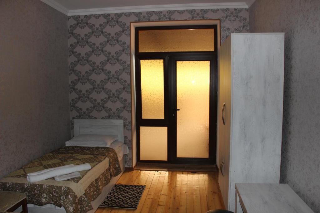 Postel nebo postele na pokoji v ubytování Hotel Rabath