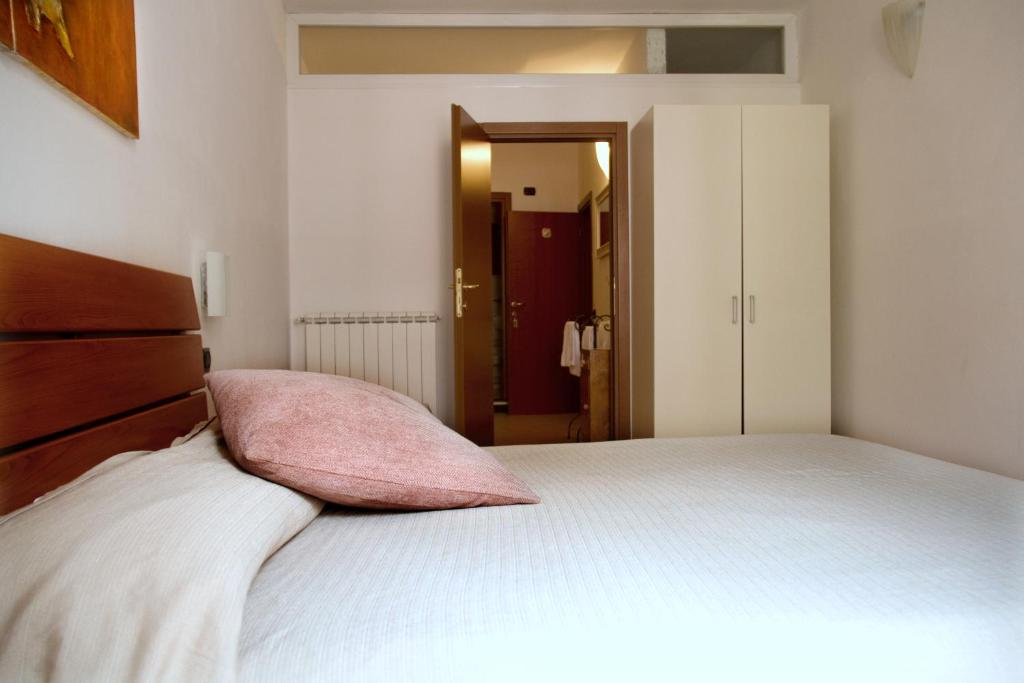 Postel nebo postele na pokoji v ubytování Affittacamere Rollando