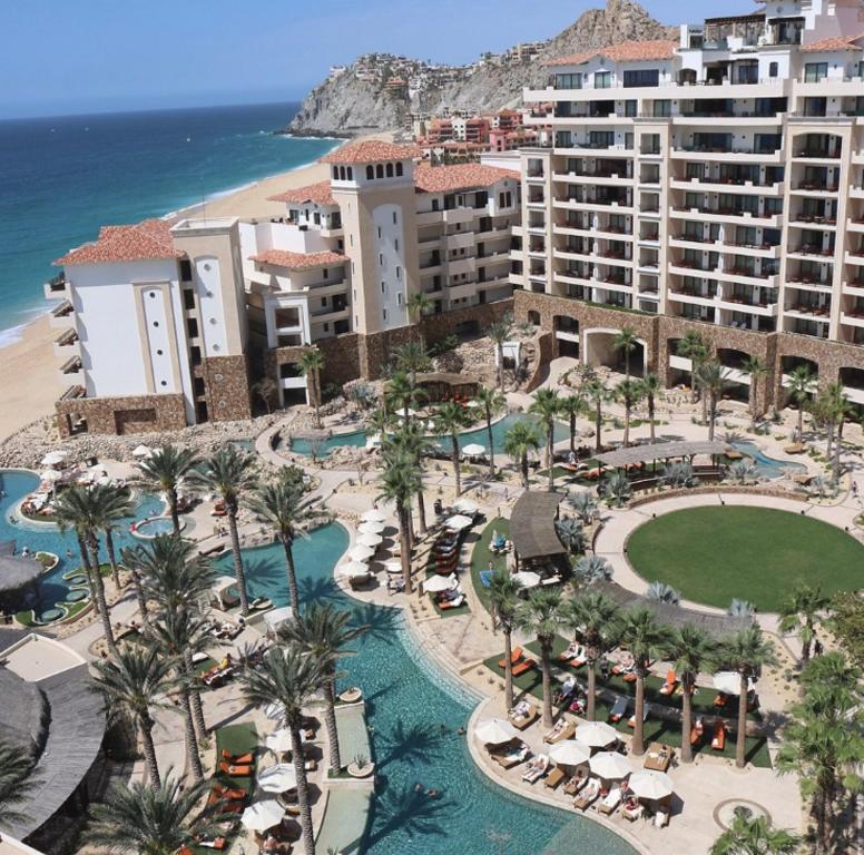 an aerial view of the resort and the beach at Suites at Gr Solmar Lands End Resort and Spa in Cabo San Lucas