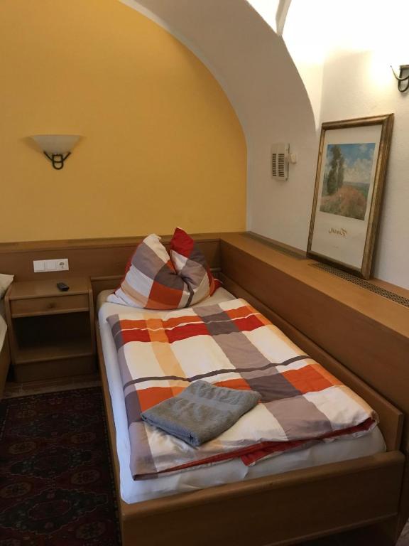Postel nebo postele na pokoji v ubytování Gasthof Polly