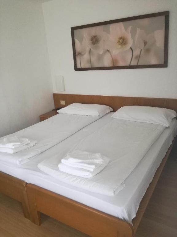 Łóżko lub łóżka w pokoju w obiekcie Park Hotel Miramonti
