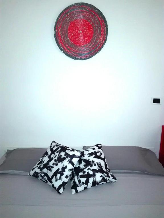 Postel nebo postele na pokoji v ubytování Sulcis Camere