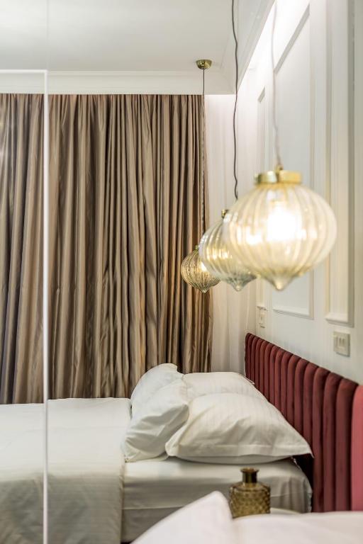 Nephelae Boutique Roomsにあるベッド